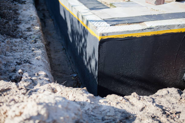 Professional Waterproofing technician working in Waunakee, WI